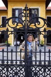 Woman on Gated Fence